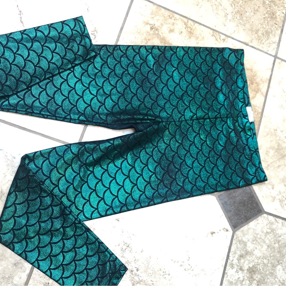 Kolouri way cool mermaid leggings. They are new without the tags. Size Large